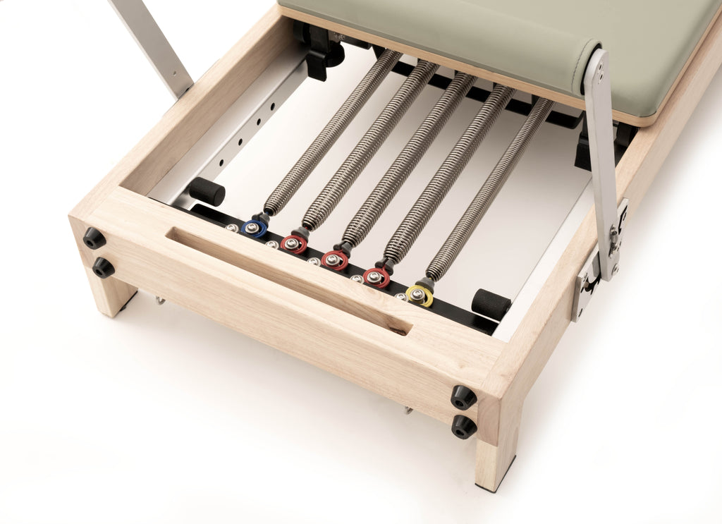 Lettino Reformer classico in legno salvaspazio Mooma